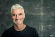 headshot of Craig Foster in casual attire