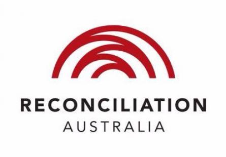 Reconciliation Australia logo, depicting the words 'Reconciliation Australia' under overlapping red semi-circular lines