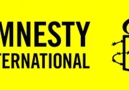 Logo for Amnesty International, depicting the outline of candle wrapped in barbed wire with the words 'Amnesty International'